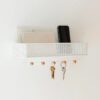 Wall rack with hooks